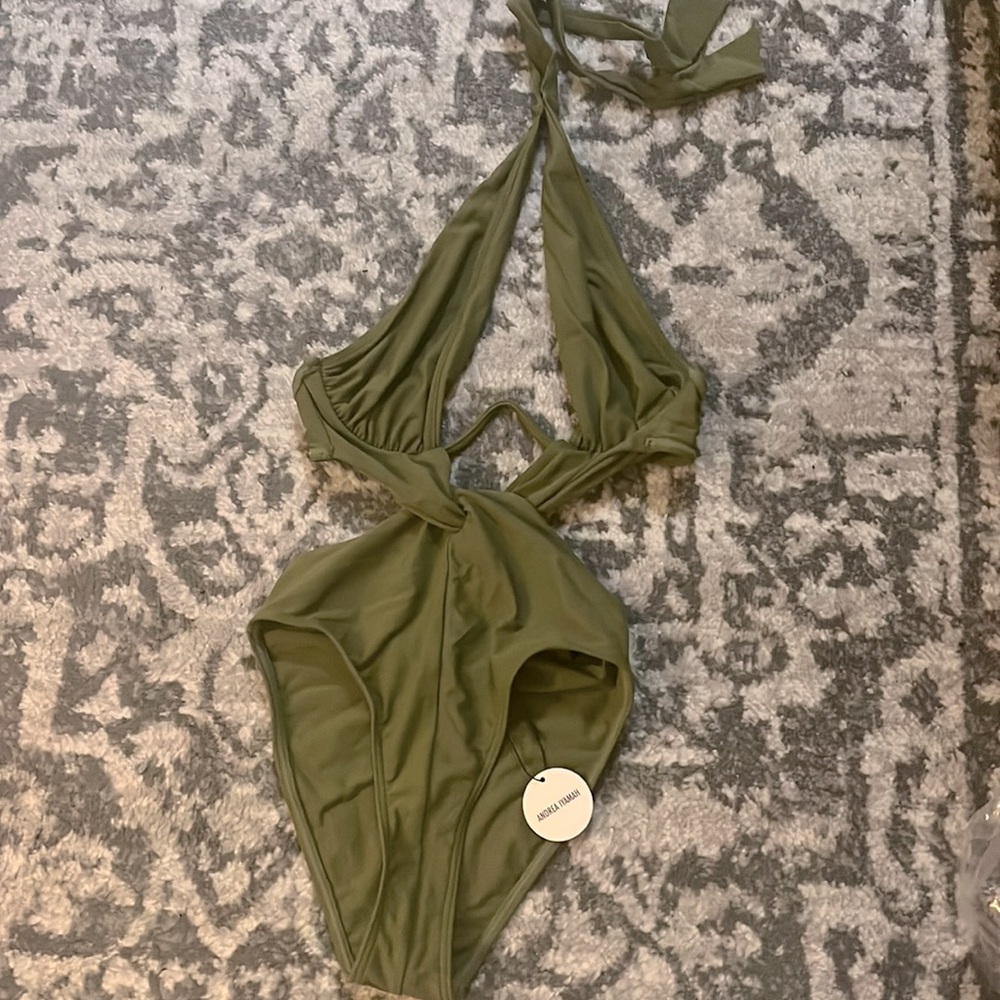Brand new with tags Revolve swimsuit by Andrea Iyamah!
